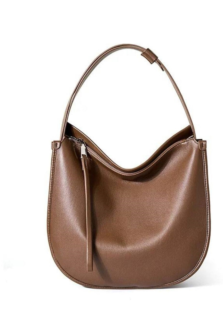 “Eleganza Minimalista” — leather bag for a modern style