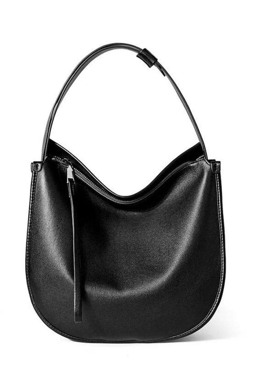 “Eleganza Minimalista” — leather bag for a modern style