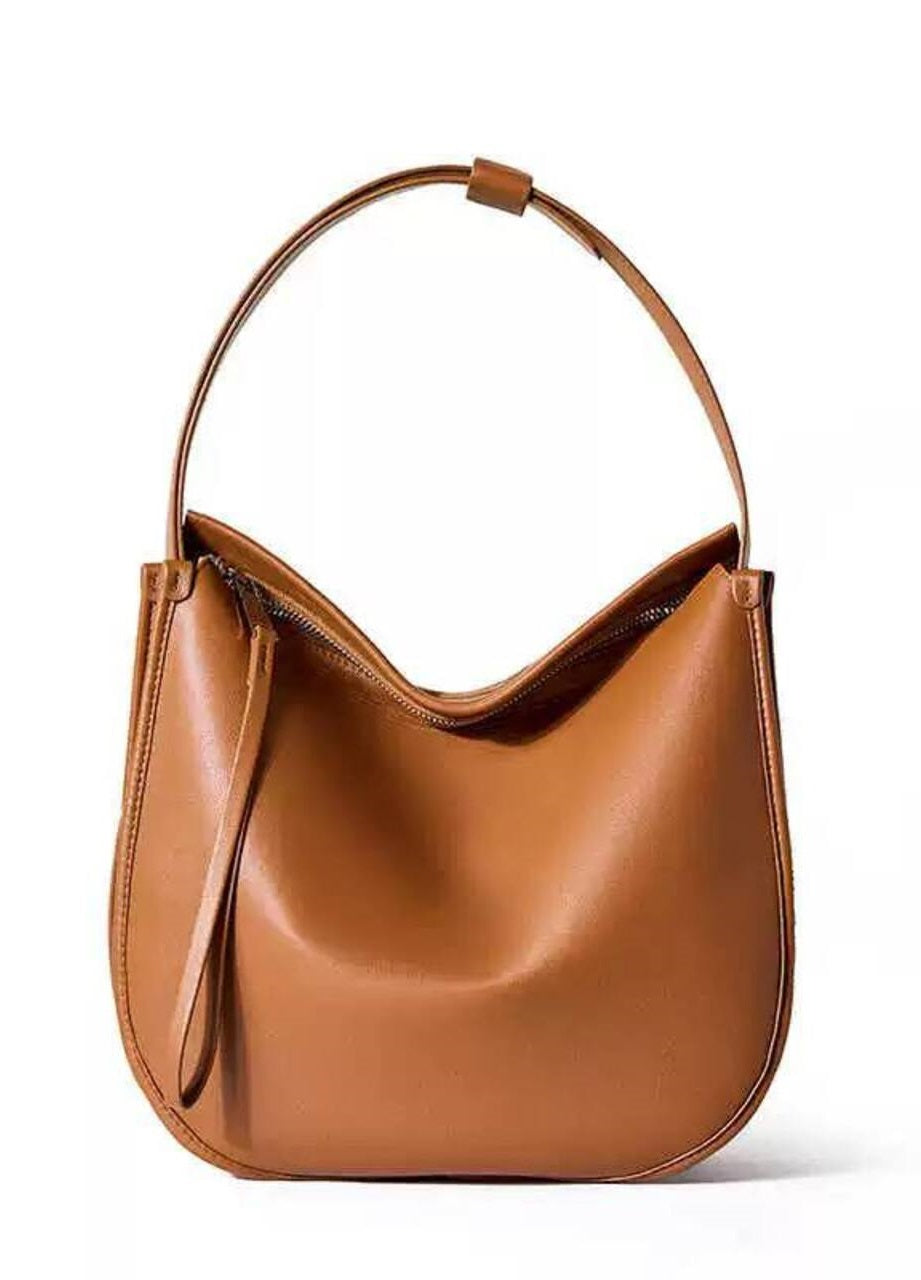 “Eleganza Minimalista” — leather bag for a modern style