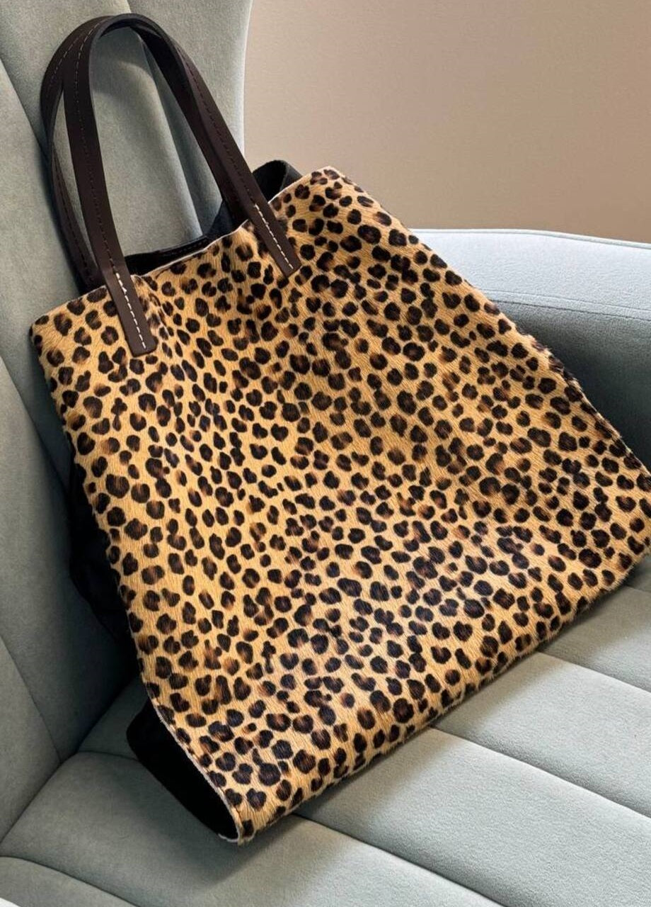 Shoppers in Genuine Leather and Fur