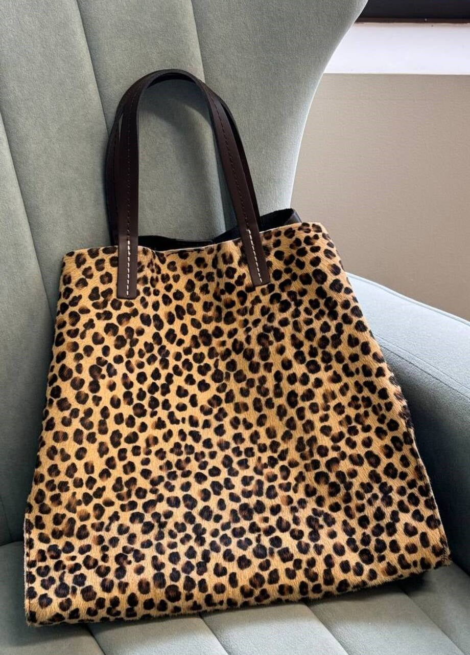 Shoppers in Genuine Leather and Fur