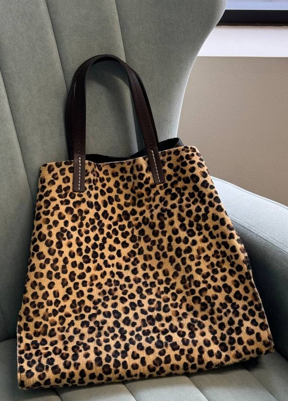 Shoppers in Genuine Leather and Fur