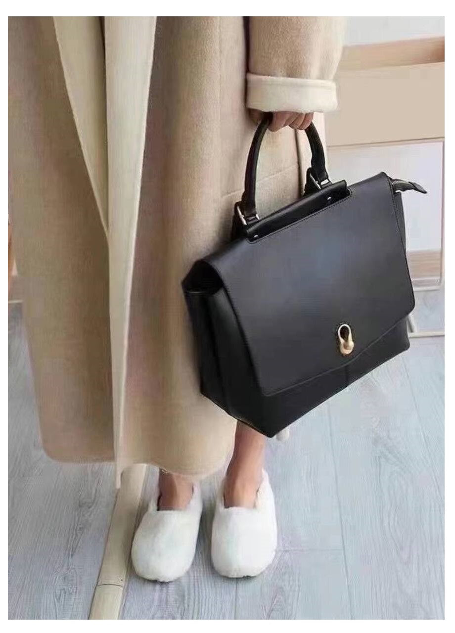 Elegant Leather Bag with Gold Hardware