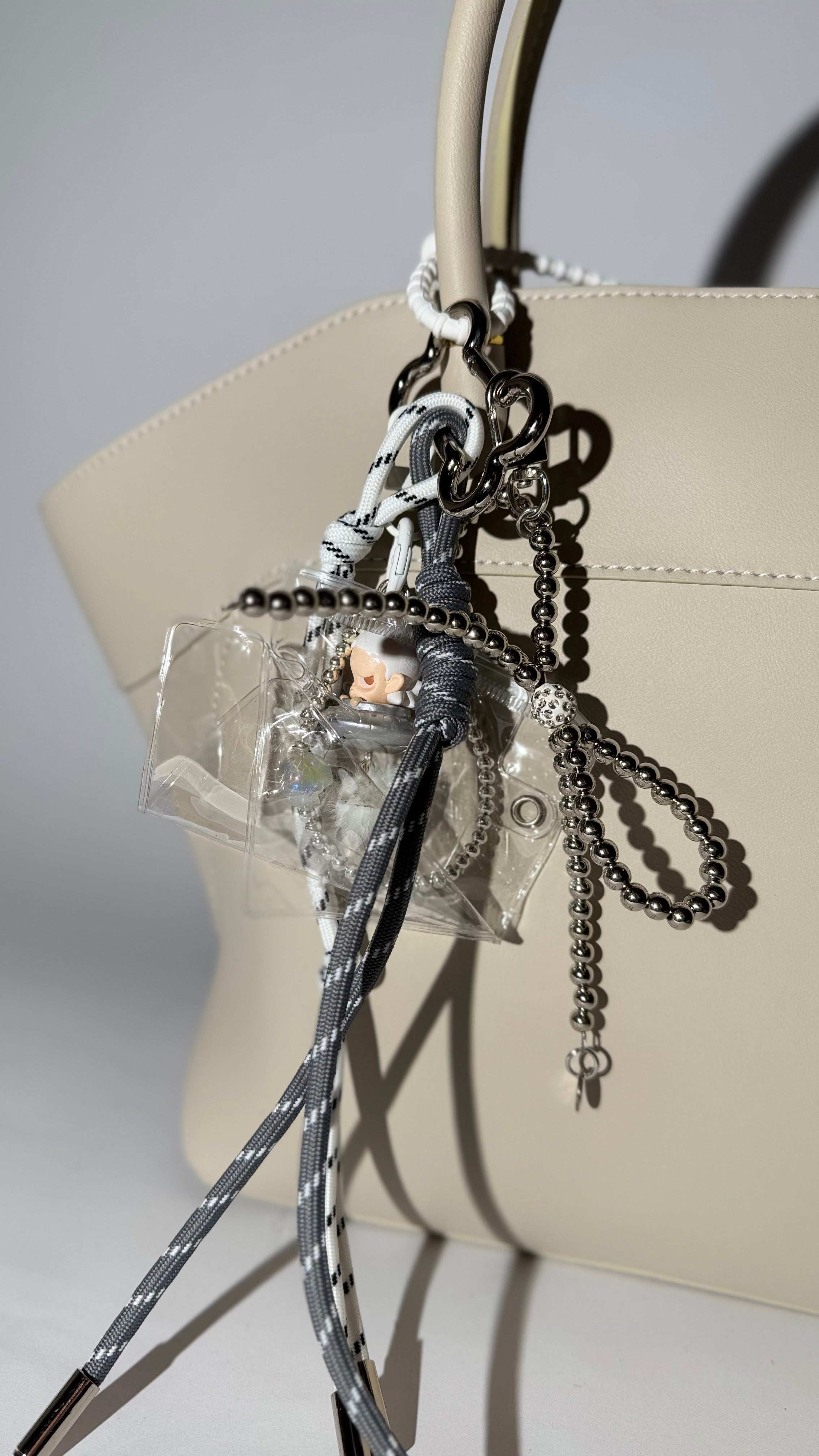 Trendy Bag Charm with Decorative Ropes – Stylish Keychain Accessory