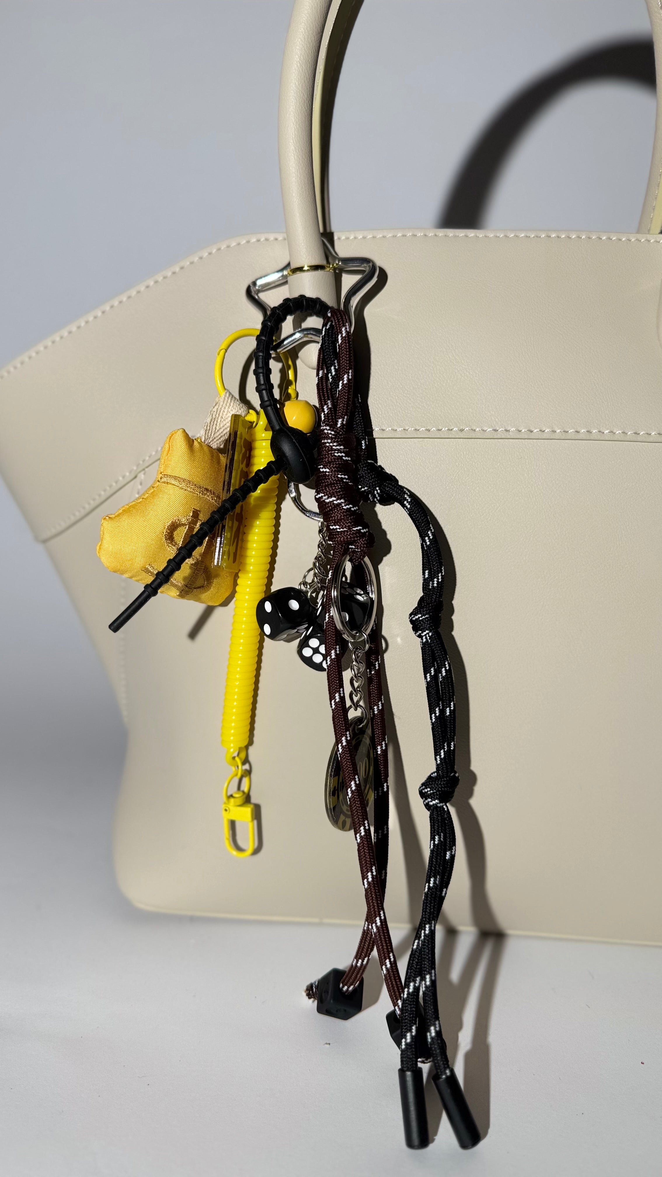 Trendy Bag Charm with Decorative Ropes – Stylish Keychain Accessory