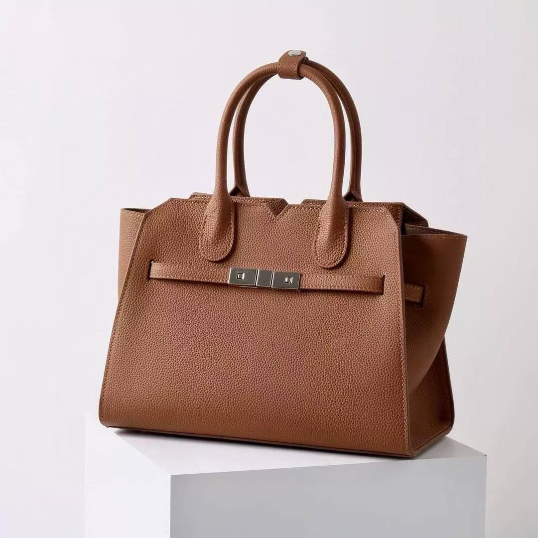 AURORA STRUCTURE” — the leather power bag for everyday icons