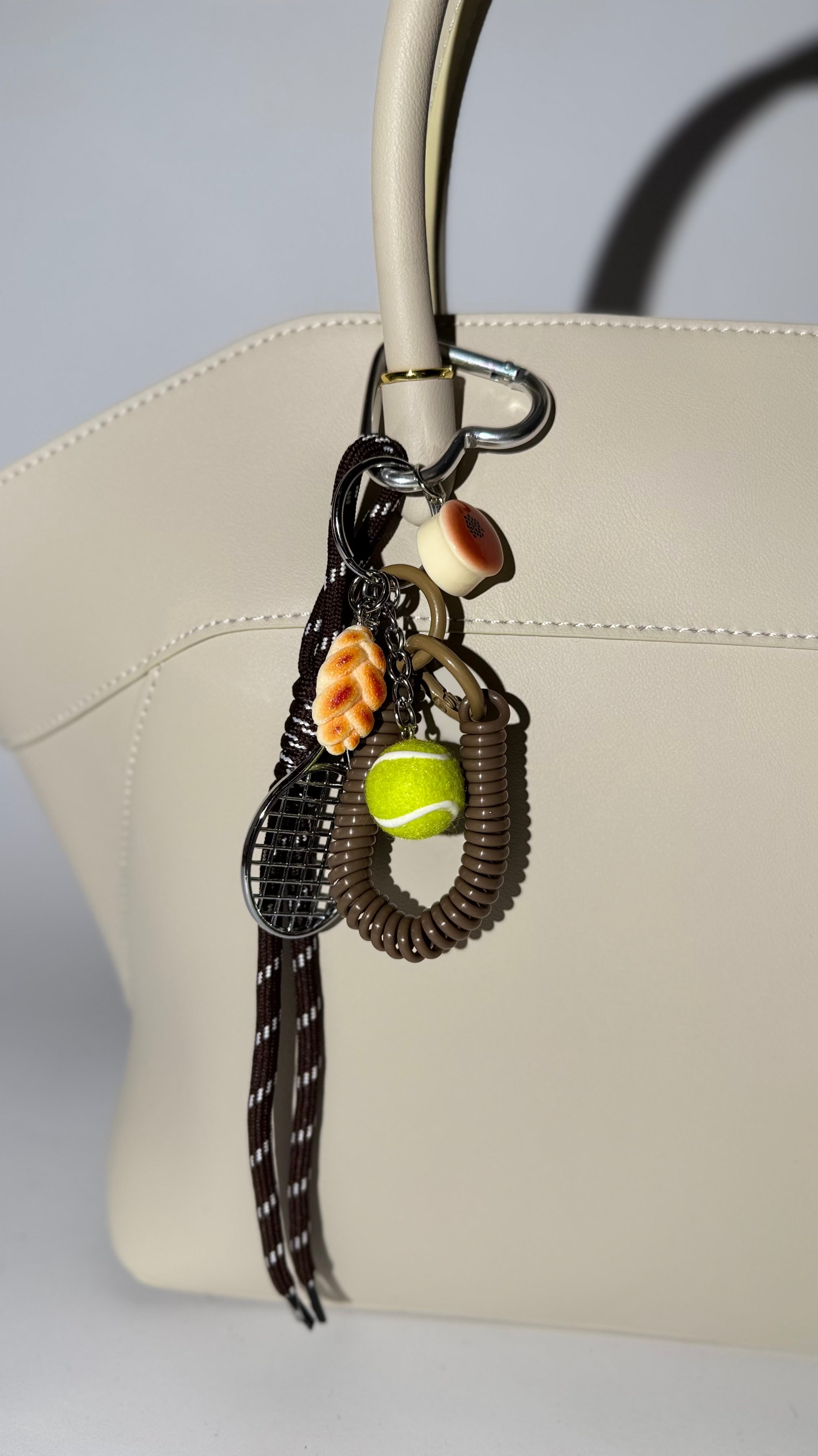 Trendy Bag Charm with Decorative Ropes – Stylish Keychain Accessory