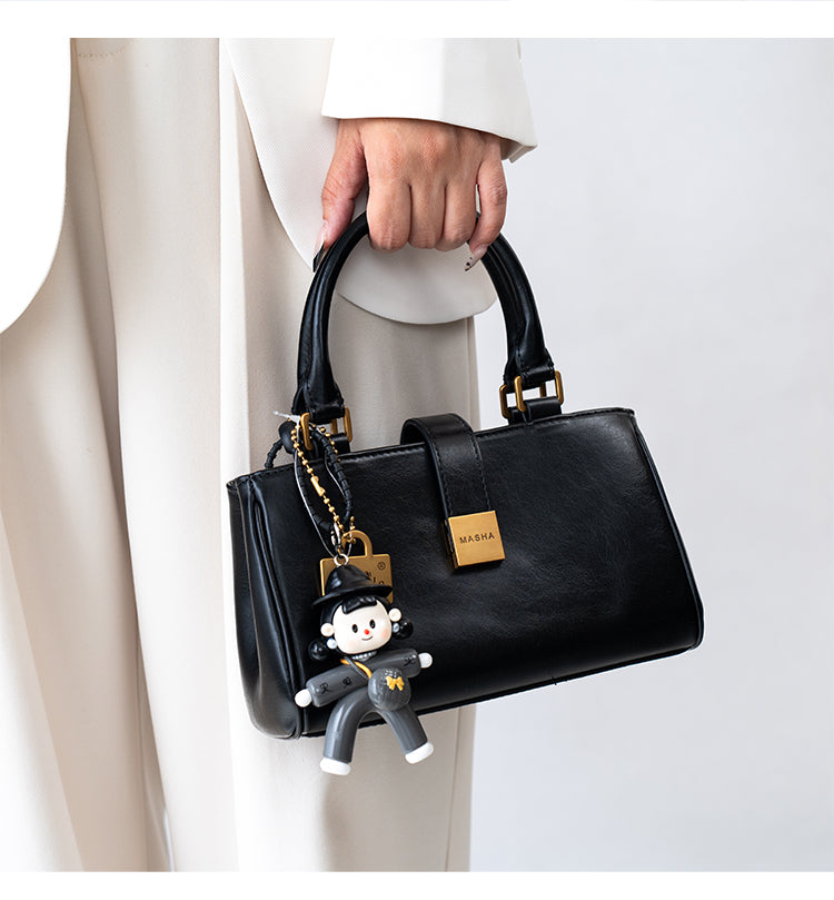 Chic Charm” – Leather Bag with Adorable Details