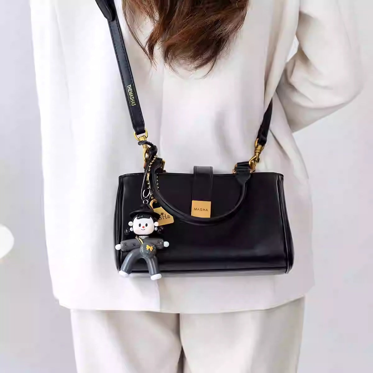 Chic Charm” – Leather Bag with Adorable Details