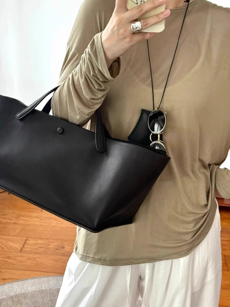 SIGNATURE — stylish and fashionable genuine leather bag with cosmetic pouch