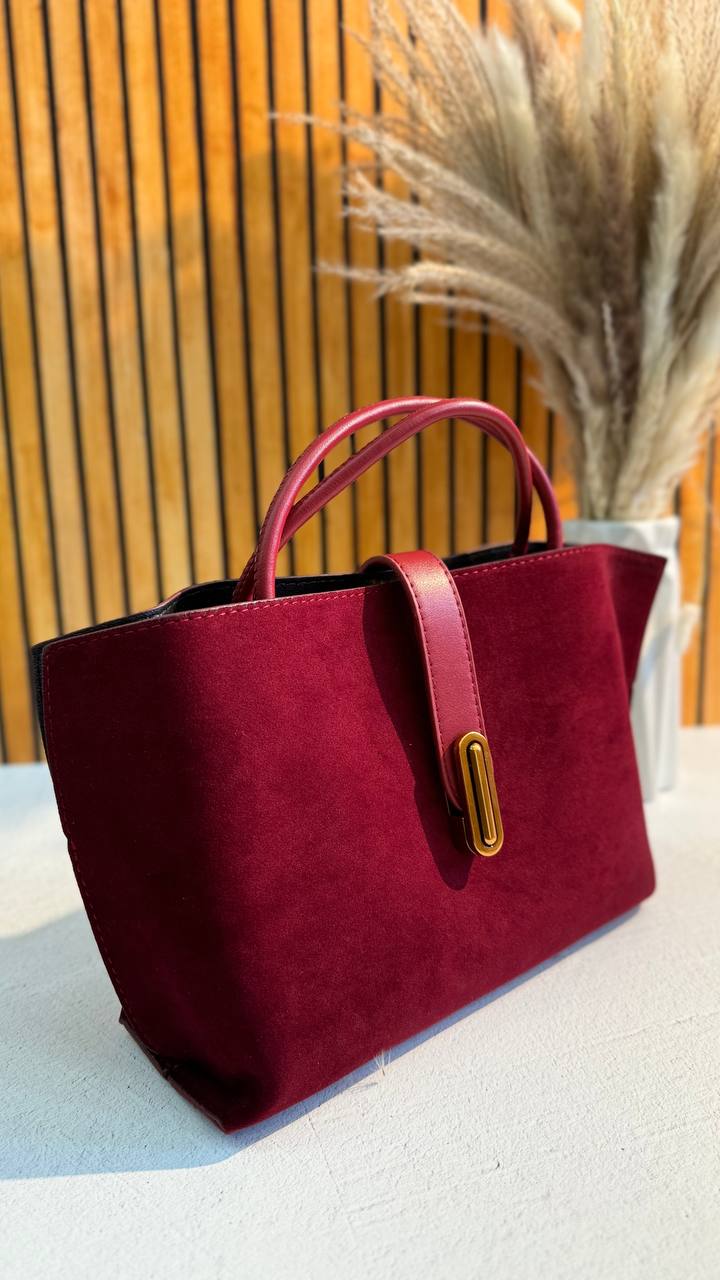 Elegant Suede Handbag with Faux Leather Accents and Detachable Strap