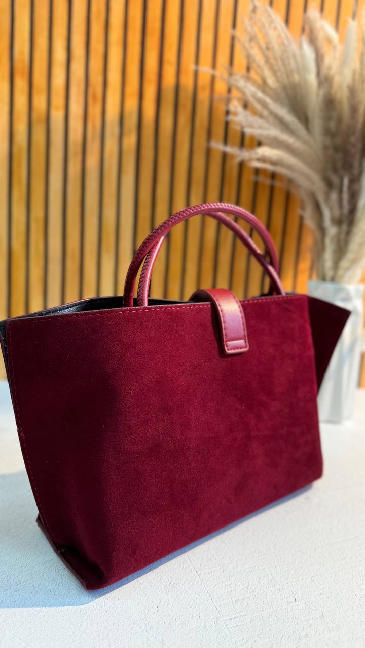 Elegant Suede Handbag with Faux Leather Accents and Detachable Strap