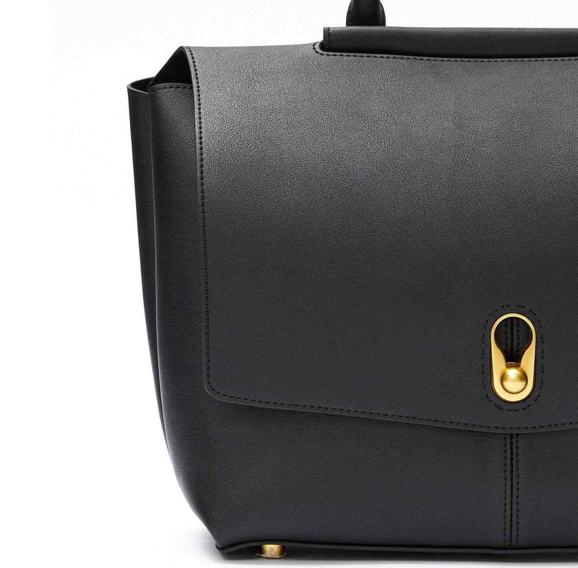 Elegant Leather Bag with Gold Hardware