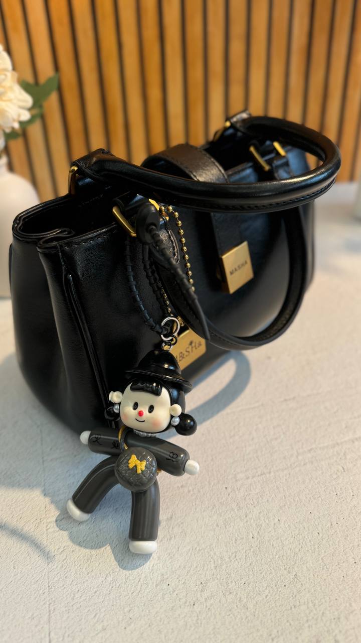 Chic Charm” – Leather Bag with Adorable Details
