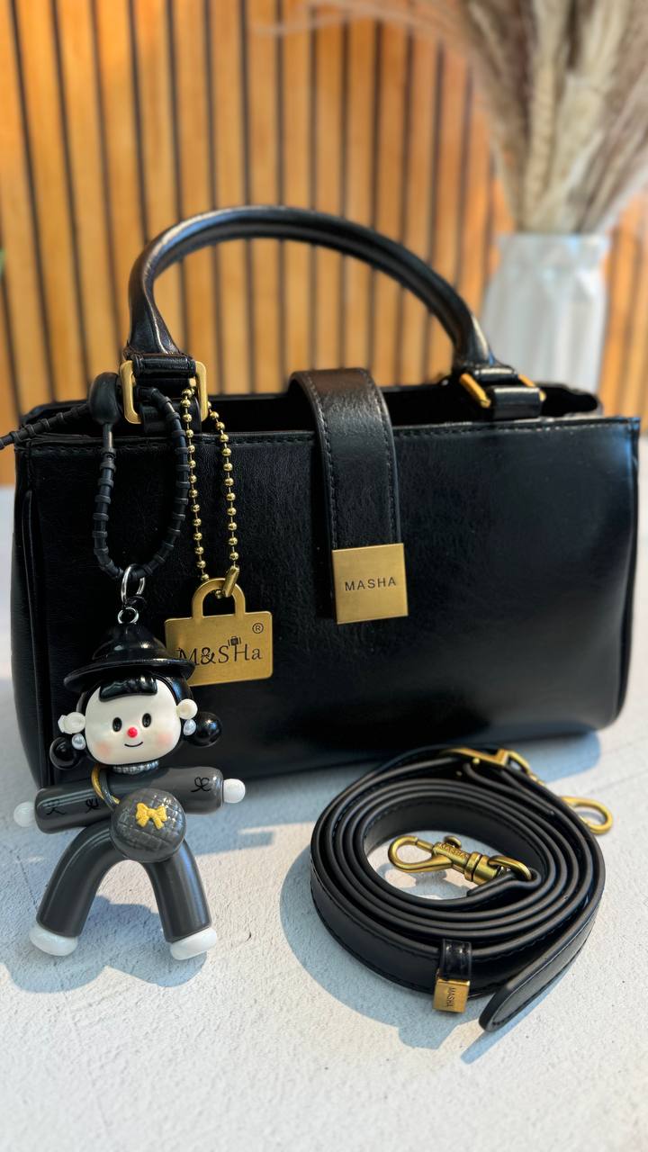 Chic Charm” – Leather Bag with Adorable Details