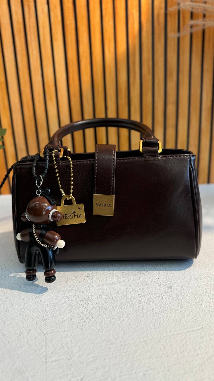 Chic Charm” – Leather Bag with Adorable Details
