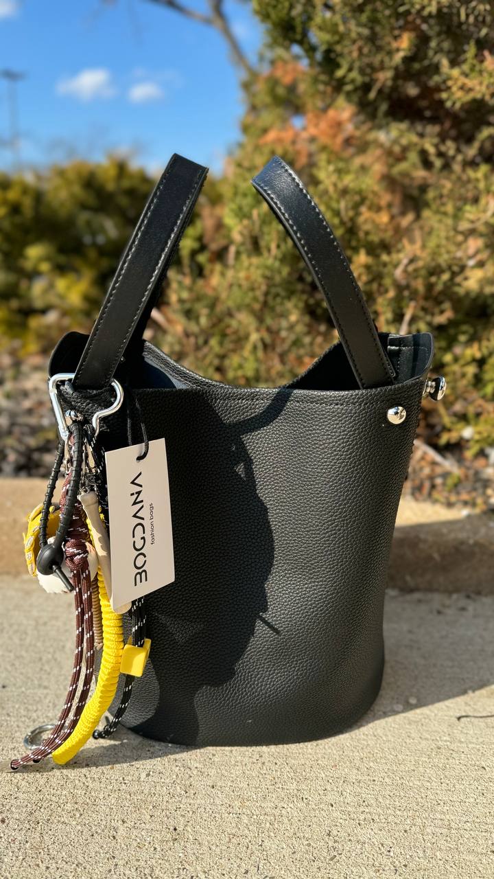 “Versatile” — leather bucket bag