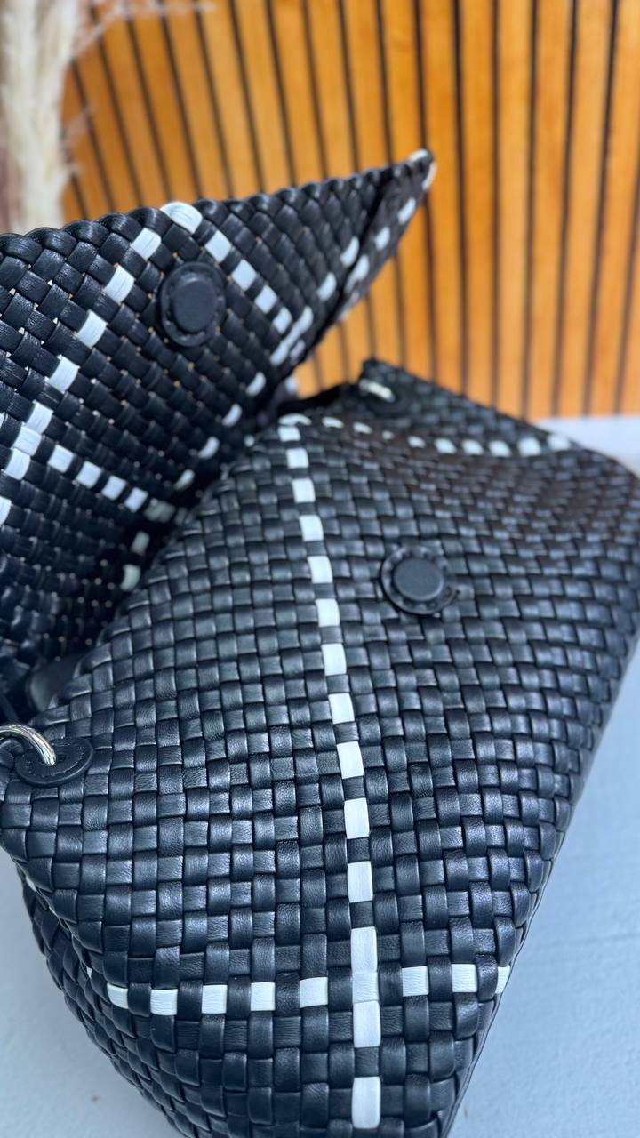 Artisan Weave-The Art of Handwoven Elegance — a handmade leather bag