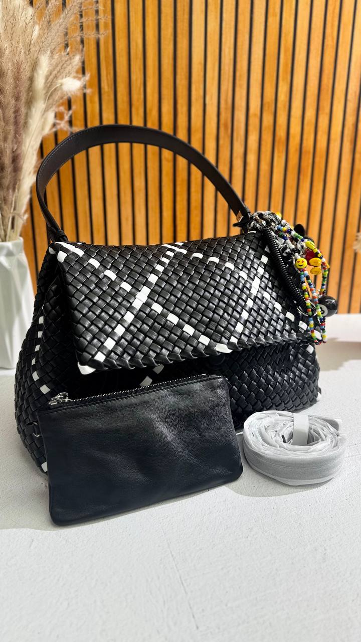 Artisan Weave-The Art of Handwoven Elegance — a handmade leather bag