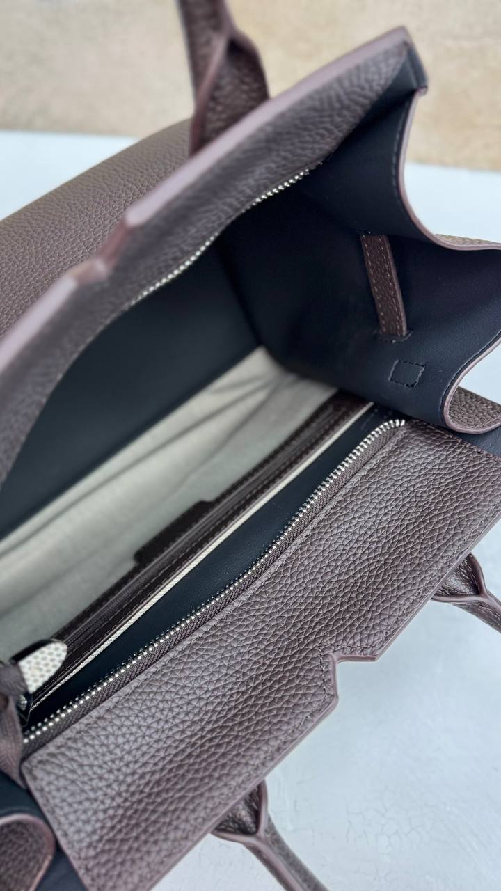 AURORA STRUCTURE” — the leather power bag for everyday icons