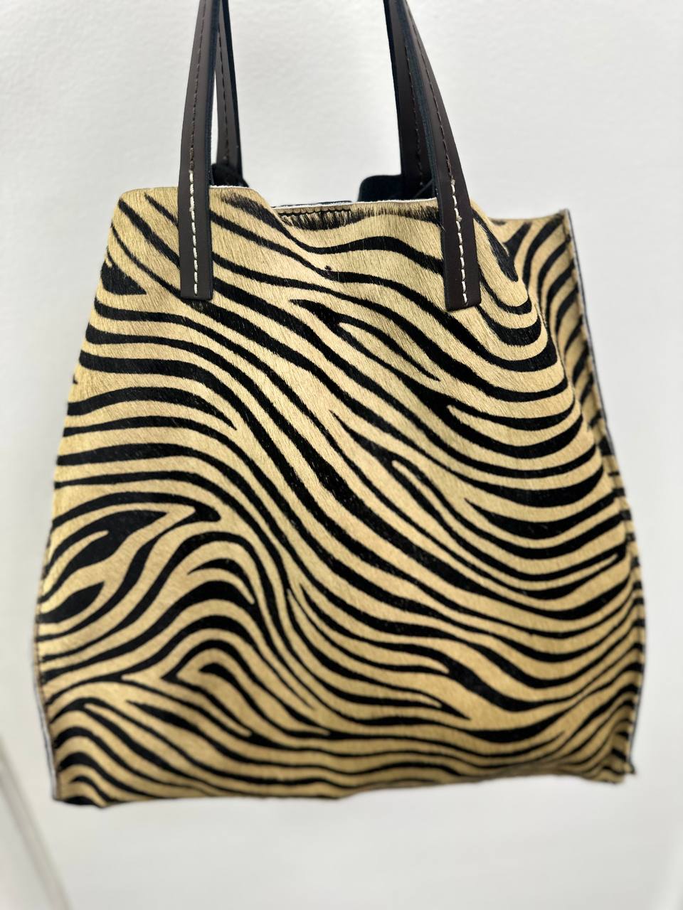 Shoppers in Genuine Leather and Fur