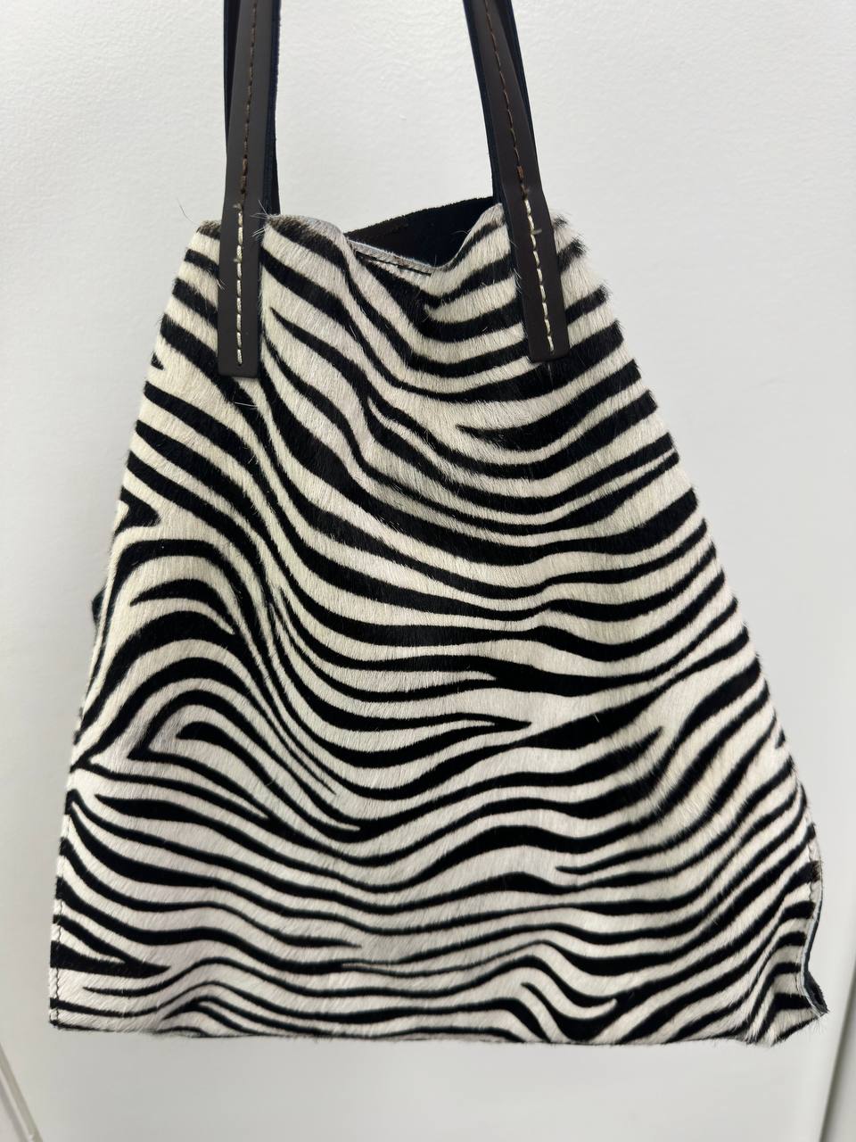 Shoppers in Genuine Leather and Fur