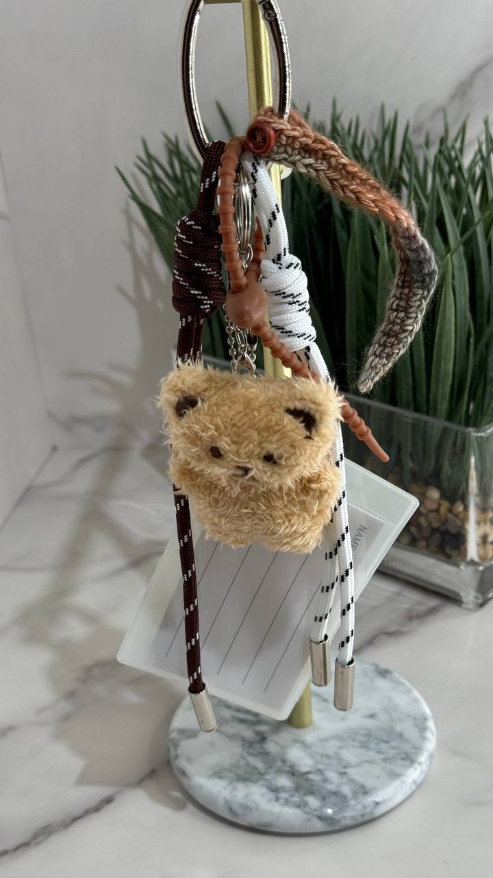 Cute bear is an adorable keychain for a bag