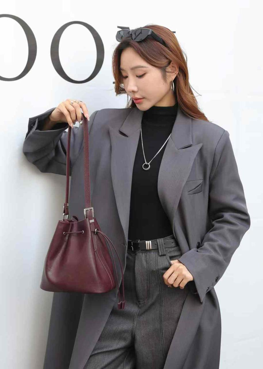 Elegant Allure: Natural Leather Bucket Bag
