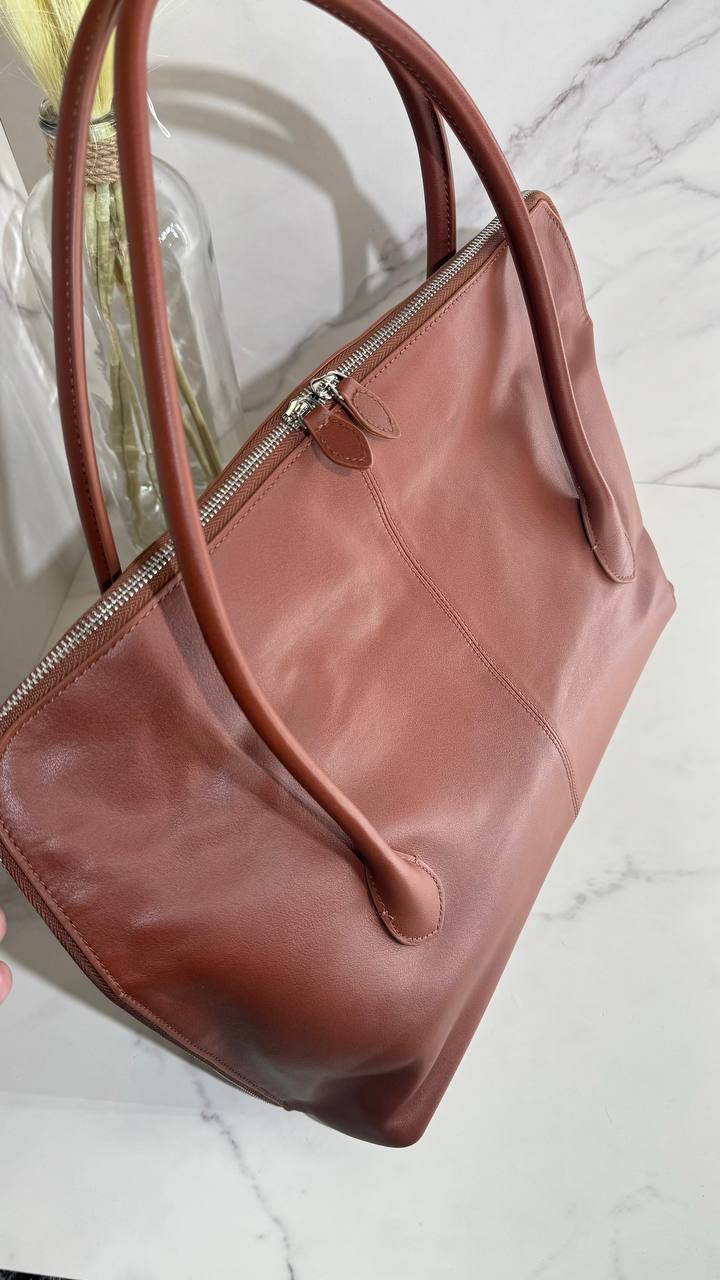 Executive Traveler — a large leather bag for business and travel.
