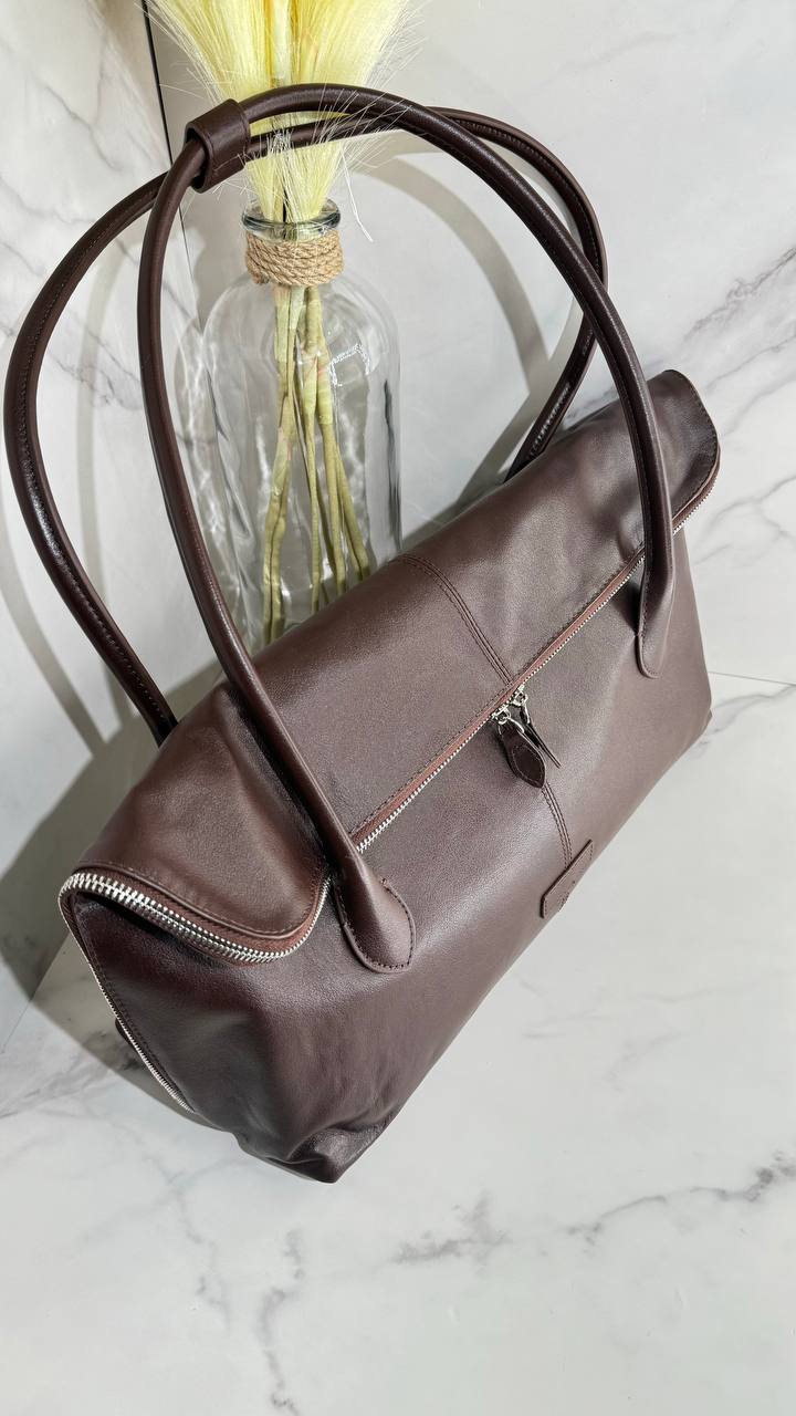 Executive Traveler — a large leather bag for business and travel.