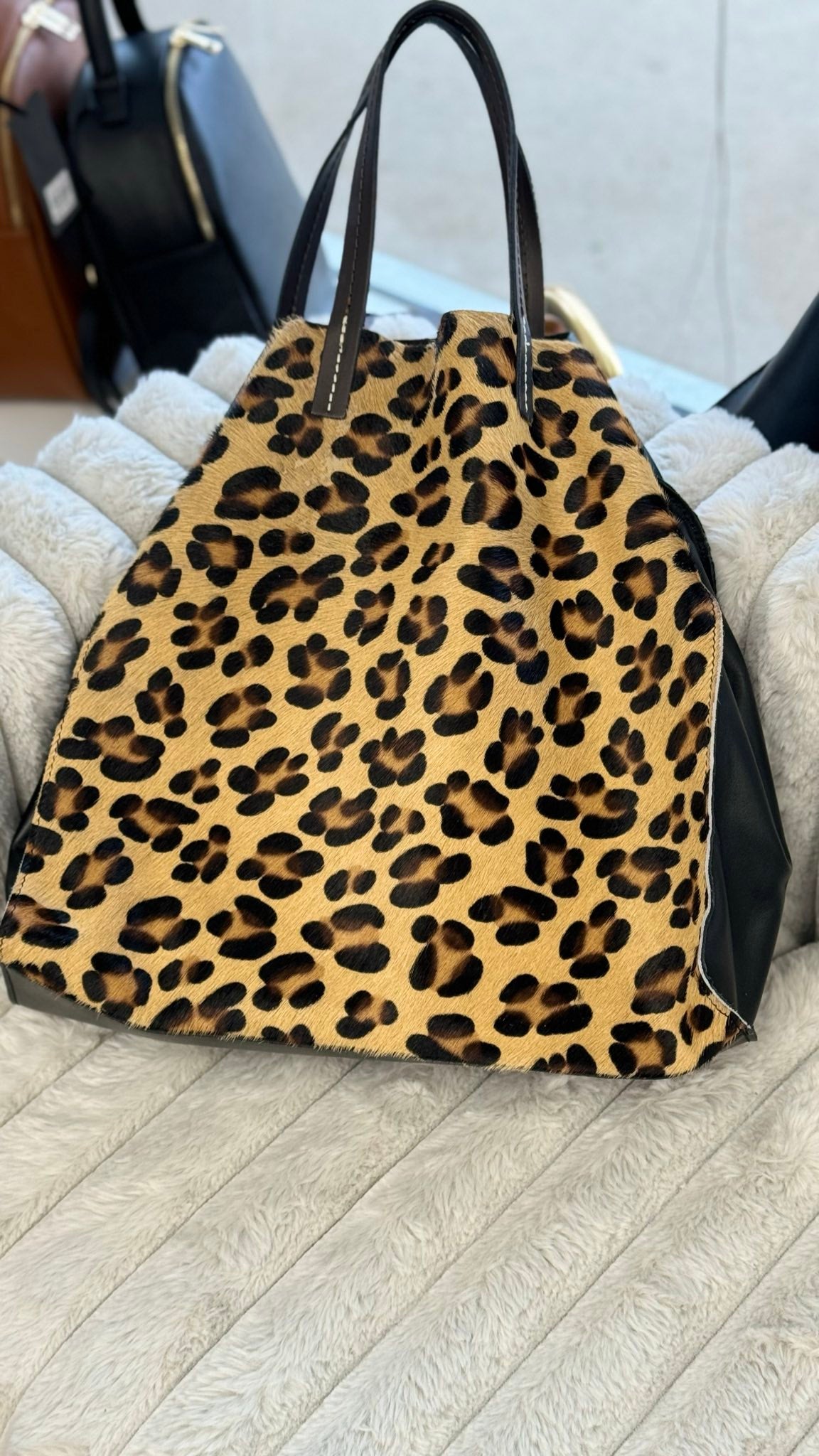 Shoppers in Genuine Leather and Fur