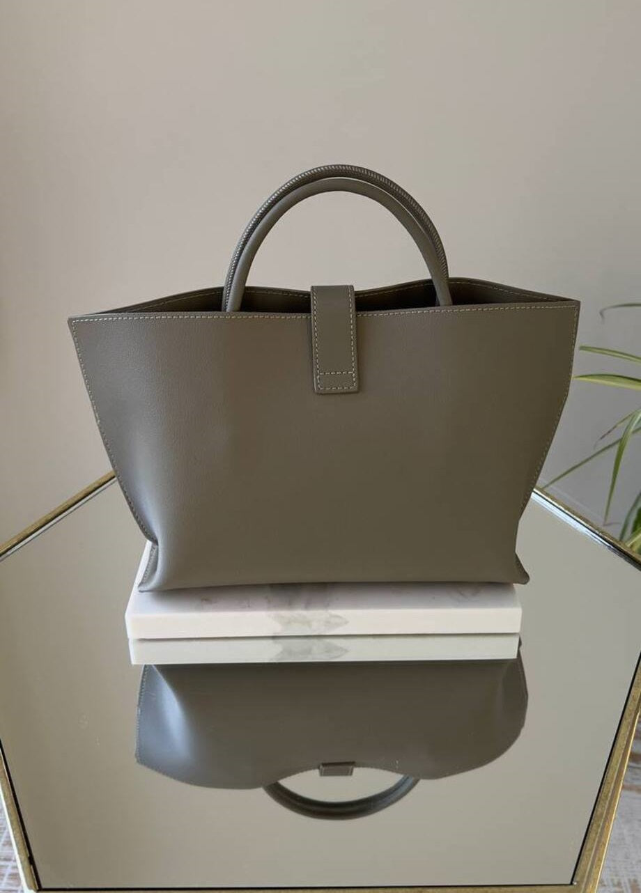 Elegant Suede Handbag with Faux Leather Accents and Detachable Strap