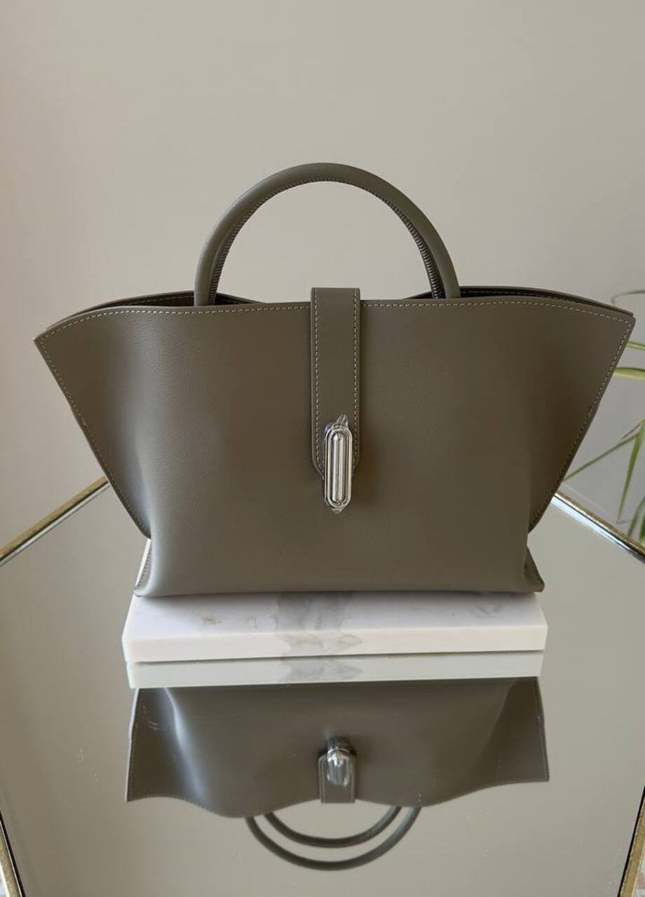 Elegant Suede Handbag with Faux Leather Accents and Detachable Strap