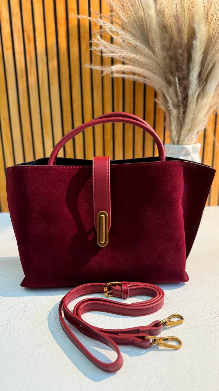 Elegant Suede Handbag with Faux Leather Accents and Detachable Strap