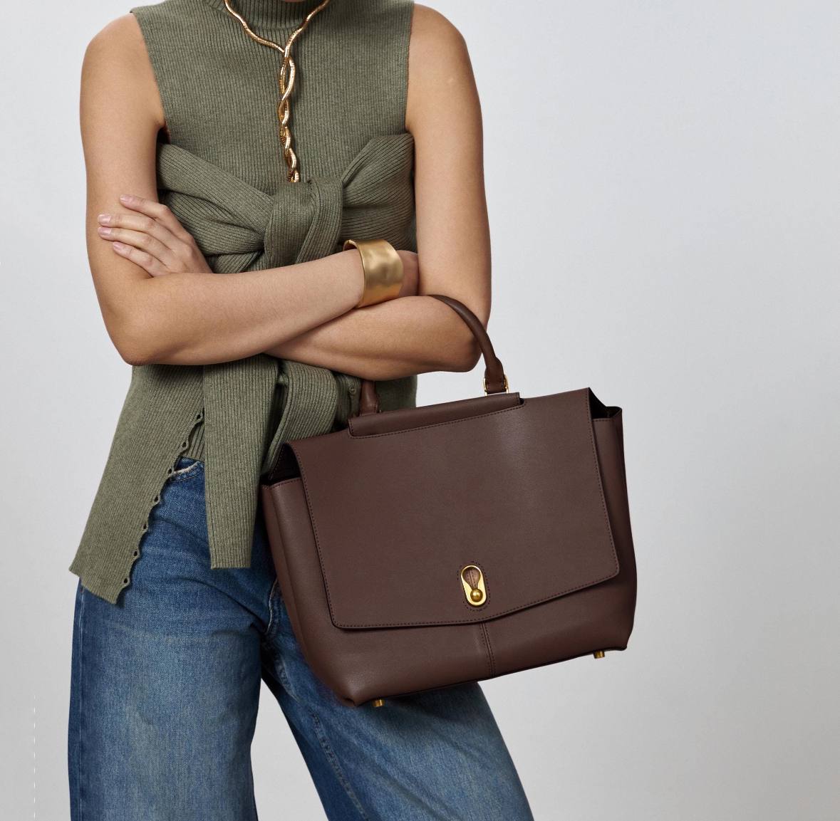 Elegant Leather Bag with Gold Hardware