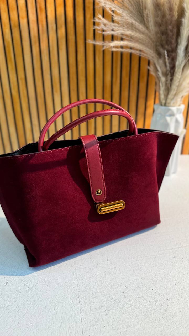 Elegant Suede Handbag with Faux Leather Accents and Detachable Strap