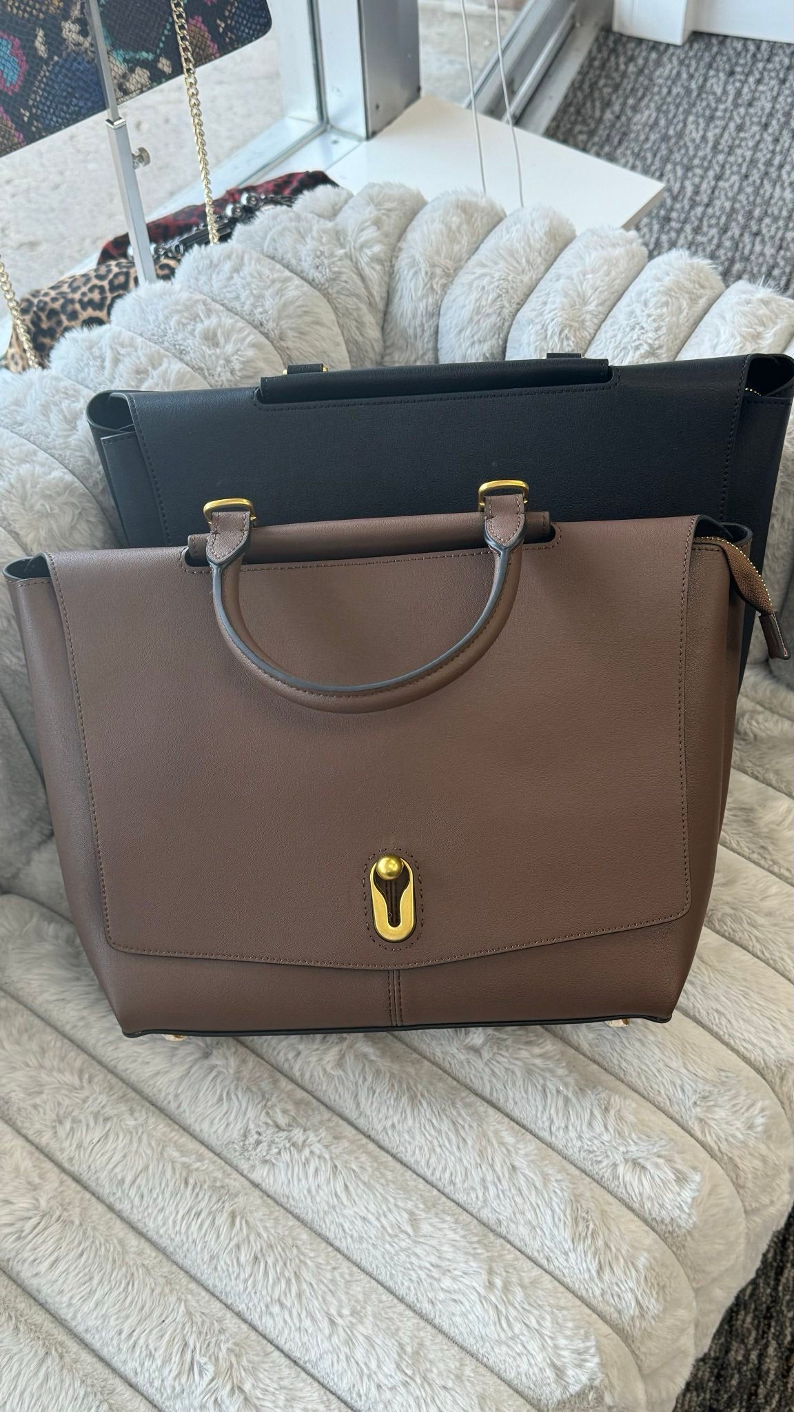 Elegant Leather Bag with Gold Hardware